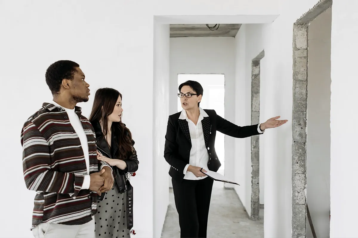 Property manager showing an apartment to prospective tenants